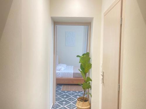 Кровать или кровати в номере Kosnian City Suites B