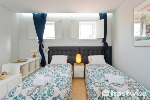 Postel nebo postele na pokoji v ubytování Comfortable Stunning Flats - City Center