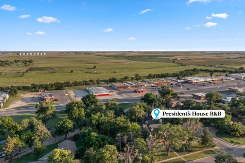 an aerial view of a parking lot at a park at Presidents House B & B in Plainview