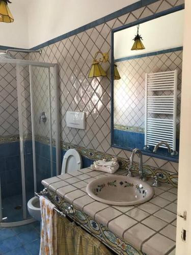 Bathroom sa Appartamento in Villa Milena