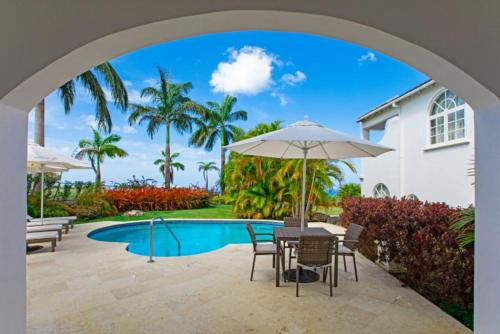 Majoituspaikassa Royal Westmoreland, Royal Villa 1 by Barbados Sothebys International Realty tai sen lähellä sijaitseva uima-allas