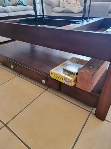 a wooden shelf with two boxes on it at Villa Teresita - vista hermosa in Coco