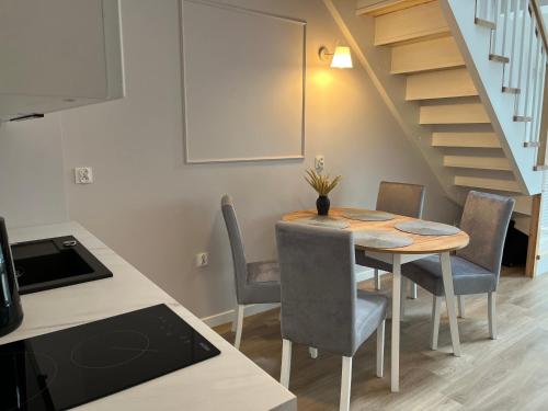 Posezení v ubytování Dwupoziomowy apartament nr 24 z dużym balkonem i podziemnym parkingiem we Władysławowie