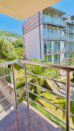 a balcony with a view of a building at Swiss Holiday in Budva