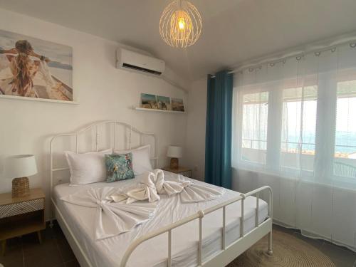 A bed or beds in a room at TONI HOUSE 505 Sveti Vlas Beach