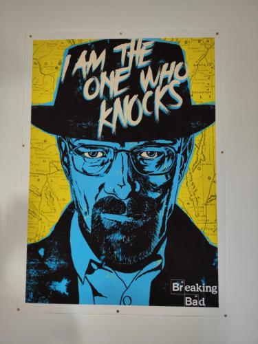 a poster of a man wearing a hat saying im the one who knocks at Blum in Brive-la-Gaillarde