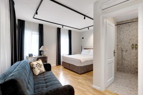 Postel nebo postele na pokoji v ubytování Bloom Hotel
