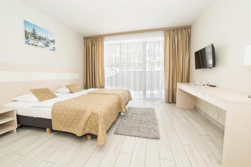 VacationClub - Solden Apartament 29 객실 침대