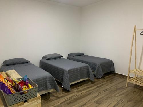 Katil atau katil-katil dalam bilik di Hospedaria Colinas