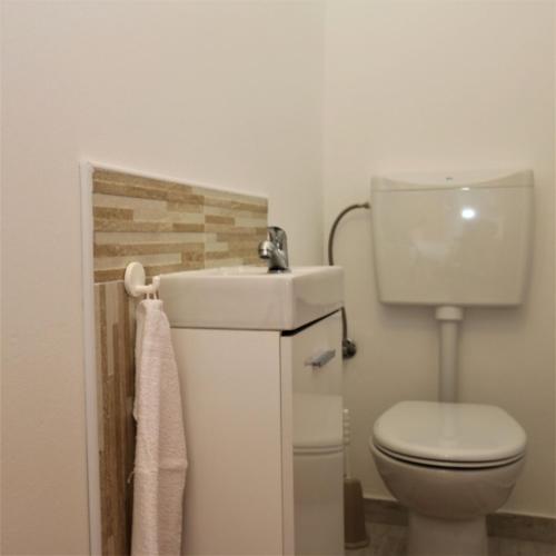 Ένα μπάνιο στο Apartment Sanjug