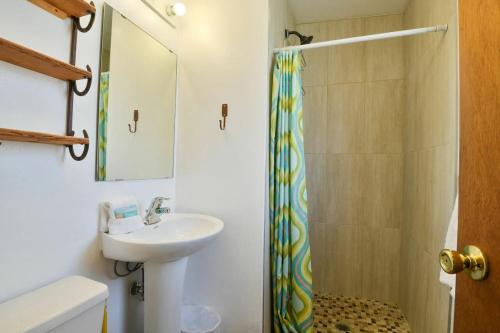 a bathroom with a sink and a shower at Near Downtown Adventure Nest - Rose Tree 4 in Moab