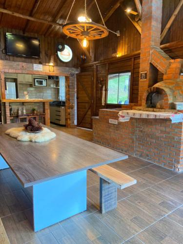 Φωτογραφία από το άλμπουμ του Chalé Cabana Sítio na Serra para amigos e familiares com Piscina σε Annitapolis