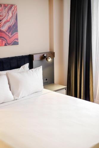 Katil atau katil-katil dalam bilik di THE ROYALS HOTEL
