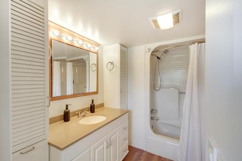 a bathroom with a sink and a shower at Charming Bay St Louis Home Deck, on Canal! in Shoreline Park