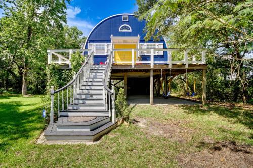 a house with stairs leading up to a building with a dome at Charming Bay St Louis Home Deck, on Canal! in Shoreline Park