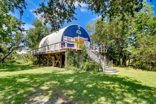 a house in a field with a dome at Charming Bay St Louis Home Deck, on Canal! in Shoreline Park