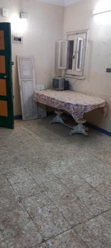 a table in the corner of a room at طنطا أول طريق شوبر in Quḩāfah