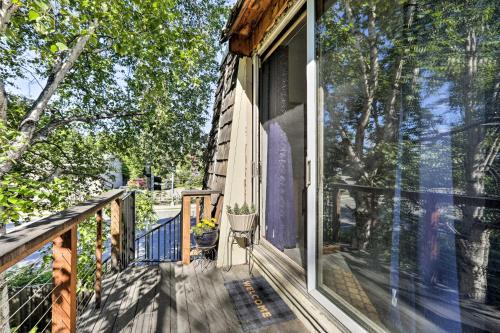 a balcony of a house with a sliding glass door at Northern Star - Studio in Fairbanks
