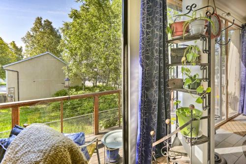 a balcony with a view of a yard at Northern Star - Studio in Fairbanks
