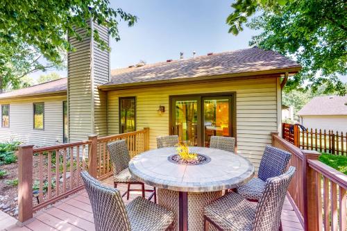 a patio with a table and chairs on a deck at Dog-Friendly Yard! Family Retreat in Fort Wayne in Sunnybrook Acres