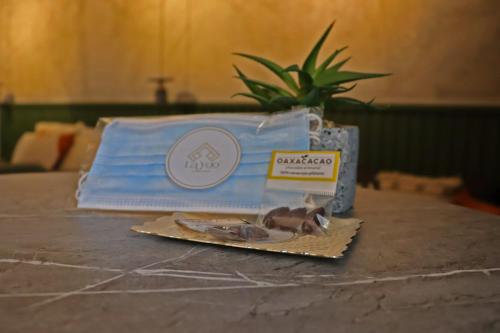 a box of diapers sitting on top of a table at Layoo, Tu casa en Oaxaca 102 in Oaxaca City