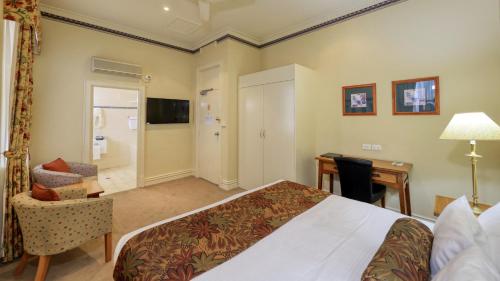 Royal Exchange Hotelにあるテレビまたはエンターテインメントセンター