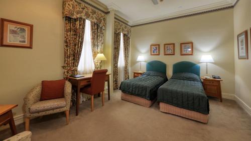 Royal Exchange Hotelにあるベッド
