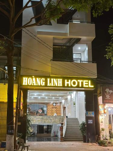 a sign for a hong limit hotel in front of a building at Hoàng Linh Hotel in Buon Ma Thuot