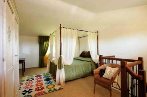 Tempat tidur dalam kamar di Appartamenti Le Terme