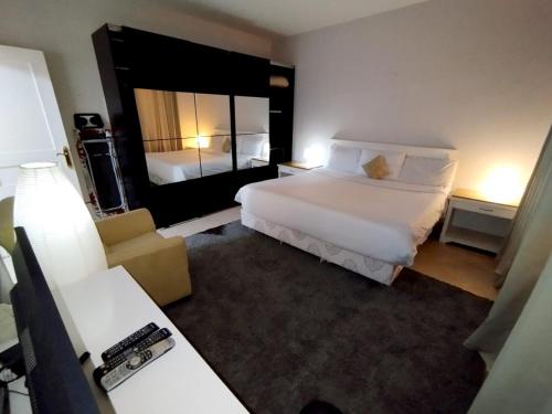 Postel nebo postele na pokoji v ubytování Villa 19, Amwaj Oyoun Resort - Beach- AquaPark Free Access