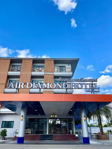 a building with a sign on the front of it at Air Diamond Hotel in Ban Nong Khong
