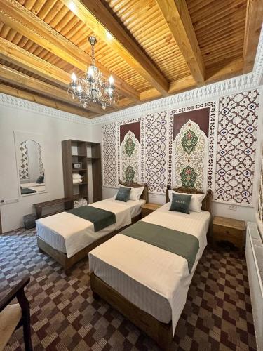 Letto o letti in una camera di AL-HAYAT