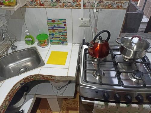 Nhà bếp/bếp nhỏ tại Mi Casa Bonita con baño privado y ducha caliente
