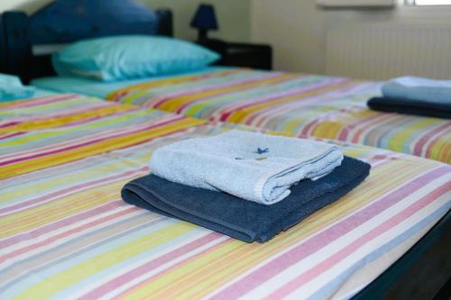 Postel nebo postele na pokoji v ubytování Andros Eco Home