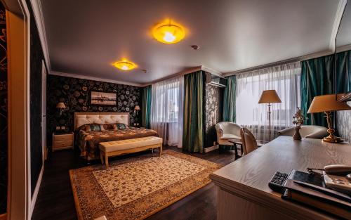 Voodi või voodid majutusasutuse Hotel Volga toas
