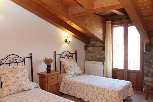 Ένα ή περισσότερα κρεβάτια σε δωμάτιο στο Apartamentos Clavería