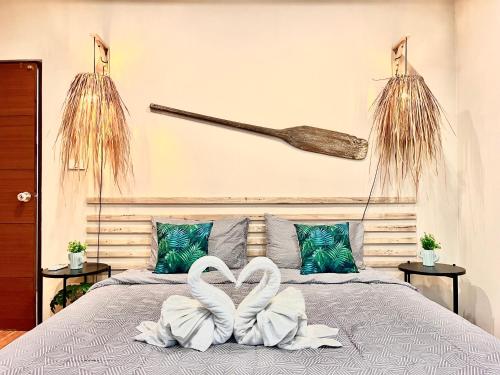 Ένα ή περισσότερα κρεβάτια σε δωμάτιο στο Sea Dreamer Beachfront Apartments