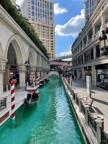 a river in a city with boats in it at Venezia Mega Outlet,shopping mall,Istanbul,luxury with view in Istanbul