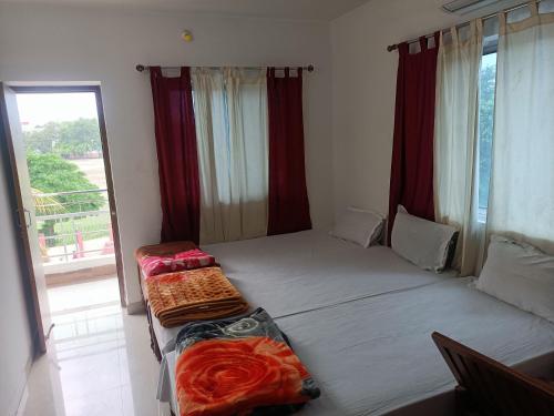 Un ou plusieurs lits dans un hébergement de l'établissement The Gupta Guest House