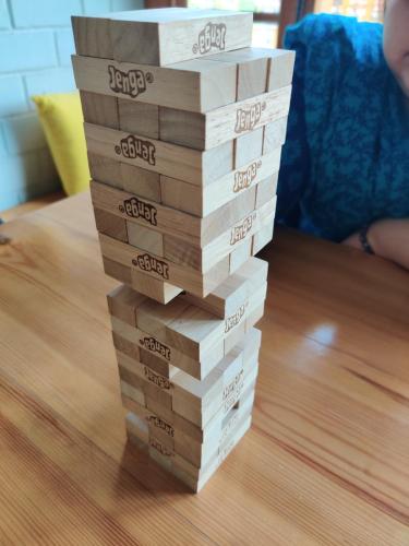 a stack of boxes sitting on top of a table at Proto Hostel in Chamba