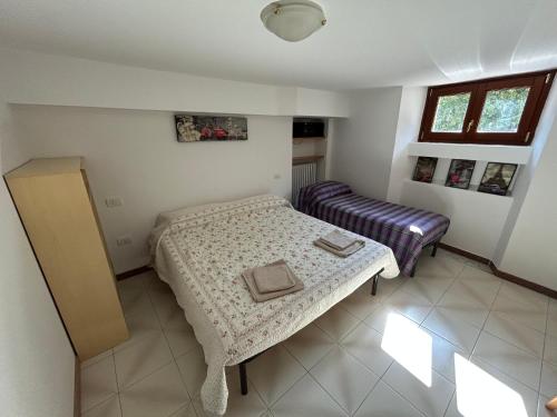 Postel nebo postele na pokoji v ubytování LB Guest House