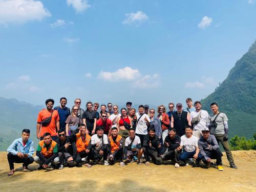 a group of people posing for a picture on a mountain at Old Quarter View Hanoi Hostel in Hanoi