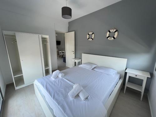 Кровать или кровати в номере La Casa Al Mare