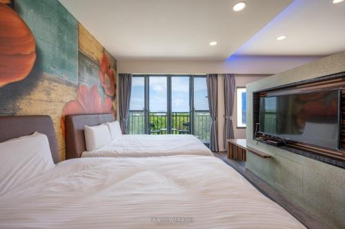 Ένα ή περισσότερα κρεβάτια σε δωμάτιο στο Sunny Ocean B&B