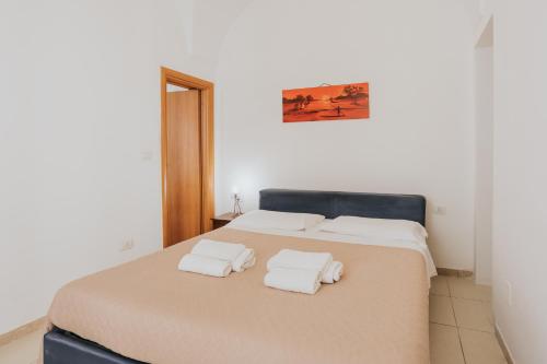 B&B Nuovo Reale - CENTRO STORICOにあるベッド