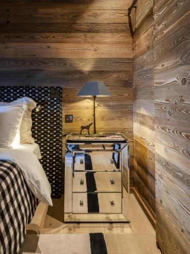 Postel nebo postele na pokoji v ubytování Superbe ferme rénovée en chalet de luxe en PLEINE NATURE