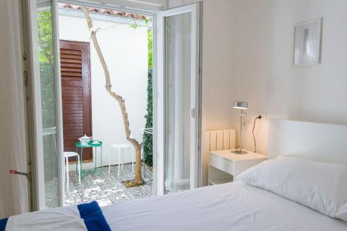 Llit o llits en una habitació de Apartments Klara