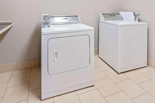 a white washer and dryer in a room at La Quinta by Wyndham Ada in Ada