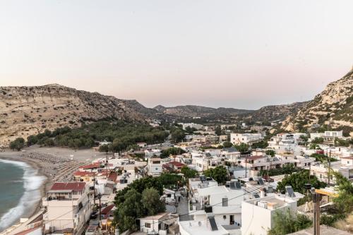 a view of a town on the beach at Georgia Apartment in Matala