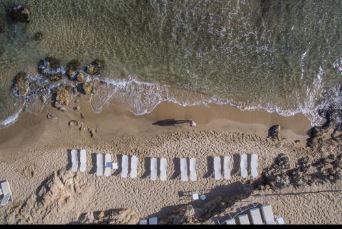 an aerial view of the beach and the ocean at Parthenis Beach, Suites by the Sea in Malia